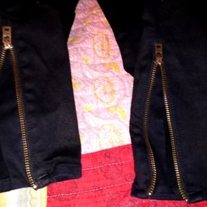 Black pants with gold accent zippers on the end good condition
